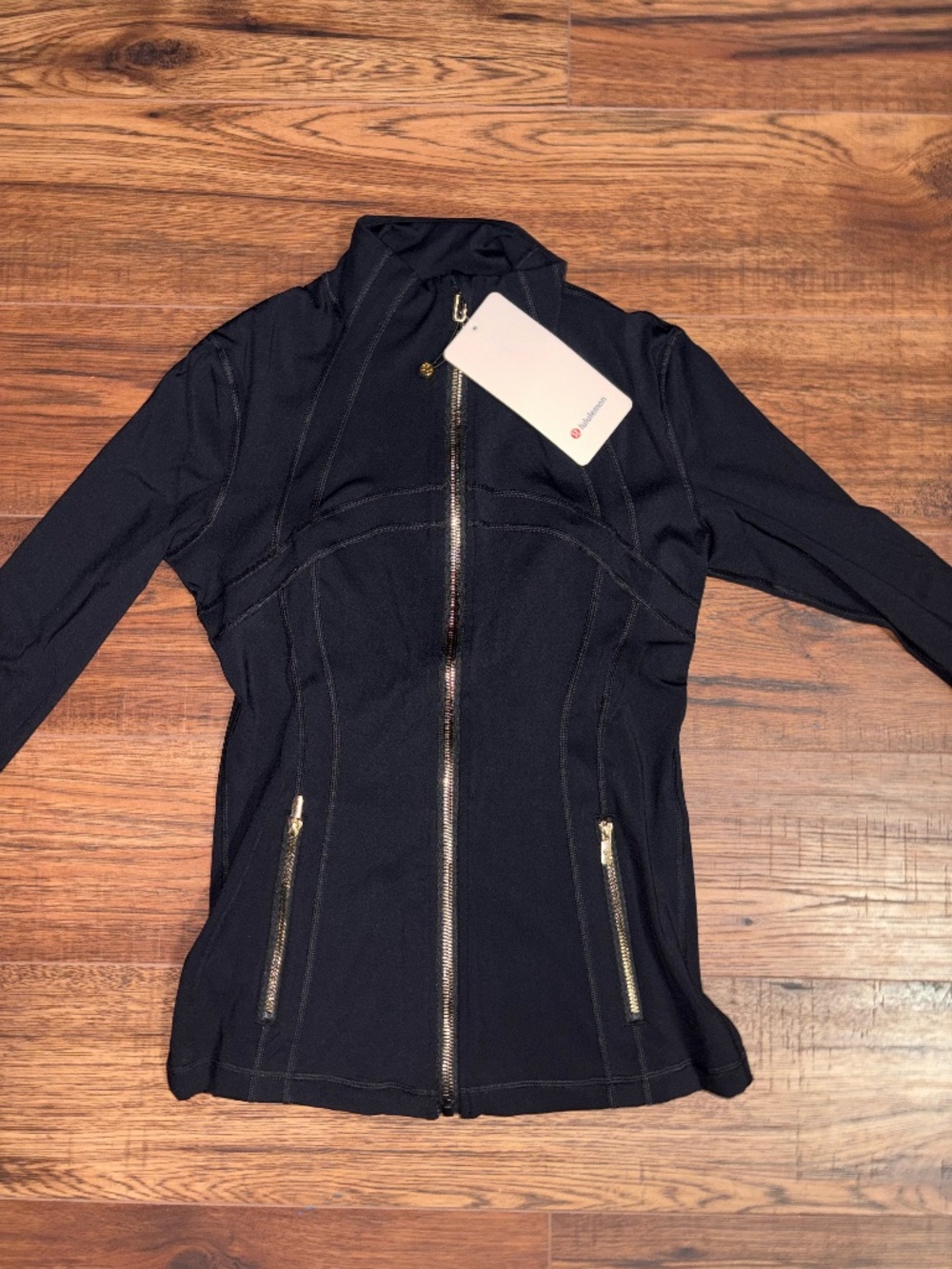 Lulu Define jacket luon Size 4 Black and Golden Zippers.